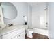 Clean bathroom with white vanity, shower, and toilet at 109 E Broad St, Salisbury, NC 28144