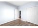 Bedroom with door to bathroom and double-door closet at 109 E Broad St, Salisbury, NC 28144