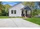 Modern farmhouse style home with a spacious driveway at 109 E Broad St, Salisbury, NC 28144