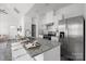 Modern kitchen with white cabinets and granite countertops at 109 E Broad St, Salisbury, NC 28144