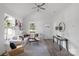 Bright living room with sectional sofa and large windows at 109 E Broad St, Salisbury, NC 28144