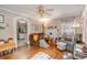 Living room with hardwood floors, fireplace, and view of kitchen at 160 Brookwood Ne Ave, Concord, NC 28025