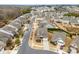 Aerial view showcasing the layout of the neighborhood, its streets, and tree-lined streets at 1605 Appledale Ct # 116, Fort Mill, SC 29715