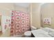Cozy bathroom featuring a patterned shower curtain and essential fixtures at 1605 Appledale Ct # 116, Fort Mill, SC 29715