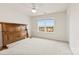 Bare bedroom with neutral carpet, a window that let's in plenty of natural light, and an unfinished headboard at 1605 Appledale Ct # 116, Fort Mill, SC 29715