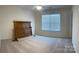 Spacious bedroom with carpeted floors and large window at 1605 Appledale Ct # 116, Fort Mill, SC 29715