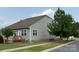 Charming home featuring gray siding, manicured lawn, and mature trees at 1605 Appledale Ct # 116, Fort Mill, SC 29715