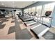 Well-equipped fitness center featuring modern treadmills and weight machines with abundant natural light at 1605 Appledale Ct # 116, Fort Mill, SC 29715