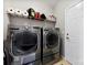 Functional laundry room equipped with modern washer and dryer units, offering convenience and efficiency at 1605 Appledale Ct # 116, Fort Mill, SC 29715