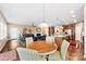 Inviting living space features an open floor plan with a dining area, kitchen, and a cozy living room with a fireplace at 1605 Appledale Ct # 116, Fort Mill, SC 29715