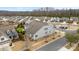 Rear view of home with a backyard patio and manicured landscaping in a residential neighborhood at 1605 Appledale Ct # 116, Fort Mill, SC 29715