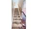 Carpeted staircase with wooden handrail and metal balusters at 1605 Appledale Ct # 116, Fort Mill, SC 29715