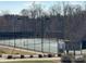 Well-maintained tennis court with lighting for evening play at 1605 Appledale Ct # 116, Fort Mill, SC 29715