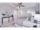 Serene bedroom featuring neutral tones, soft lighting, and a ceiling fan for optimal comfort at 1721 Edgewater Dr, Charlotte, NC 28210