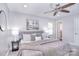 Comfortable main bedroom features plush bedding, a ceiling fan, and soothing decor at 1721 Edgewater Dr, Charlotte, NC 28210