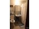 Clean bathroom with shower/tub combo and updated vanity at 1724 Lowder St, Albemarle, NC 28001