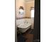 Bathroom with clawfoot tub and patterned border at 1724 Lowder St, Albemarle, NC 28001