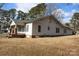 Side view of a white house with a large yard at 1724 Lowder St, Albemarle, NC 28001