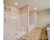 Bathroom with shower, bathtub and tile floor at 177 Jim Hanna Ln # 4510, Wadesboro, NC 28170