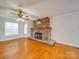 Stone fireplace with wood mantel in living room at 177 Jim Hanna Ln # 4510, Wadesboro, NC 28170