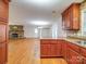 Kitchen with wood cabinets and a view of the living room at 177 Jim Hanna Ln # 4510, Wadesboro, NC 28170