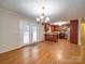 Kitchen with island, hardwood floors and stainless steel appliances at 177 Jim Hanna Ln # 4510, Wadesboro, NC 28170