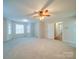 Spacious living room with neutral carpeting and ceiling fan at 177 Jim Hanna Ln # 4510, Wadesboro, NC 28170