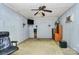 Spacious basement room with ceiling fan and entertainment center at 1801 Windsor Dr, Lancaster, SC 29720