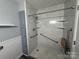 Walk-in shower with grab bars and marble walls at 190 Nine Patch Ln, Taylorsville, NC 28681