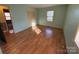 Bright bedroom with wood-look floors and ample closet space at 190 Nine Patch Ln, Taylorsville, NC 28681