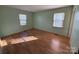 Bedroom with light walls and laminate wood flooring at 190 Nine Patch Ln, Taylorsville, NC 28681