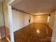 Spacious dining room with hardwood floors and a chandelier at 190 Nine Patch Ln, Taylorsville, NC 28681