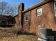 Brick home exterior showcasing a back view and HVAC unit at 190 Nine Patch Ln, Taylorsville, NC 28681