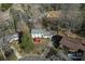 Aerial view of a Ranch style home with a large backyard and surrounding trees at 1968 12Th Street Ne Pl, Hickory, NC 28601