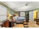 Main bedroom with king-size bed and large windows at 1968 12Th Street Ne Pl, Hickory, NC 28601