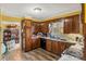 Galley style kitchen with wood cabinets and ample counter space at 1968 12Th Street Ne Pl, Hickory, NC 28601