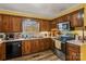 Classic kitchen featuring wood cabinets and stainless steel appliances at 1968 12Th Street Ne Pl, Hickory, NC 28601