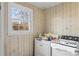 Functional laundry room complete with washer and dryer at 1968 12Th Street Ne Pl, Hickory, NC 28601