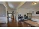 Spacious living room featuring hardwood floors, neutral walls, and open layout at 2001 Yellow Daisy Dr, Matthews, NC 28104