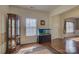 Open layout living room featuring hardwood floors, neutral walls, and stylish decor at 2001 Yellow Daisy Dr, Matthews, NC 28104