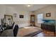 Living room featuring hardwood floors, neutral walls, and stylish decor at 2001 Yellow Daisy Dr, Matthews, NC 28104