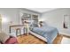 Cozy bedroom with a comfortable bed and built-in desk at 2025 Ibis Ct, Charlotte, NC 28205