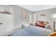 Small bedroom with a sofa and built-in closet at 2025 Ibis Ct, Charlotte, NC 28205