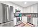 Modern kitchen with stainless steel appliances and granite countertops at 2025 Ibis Ct, Charlotte, NC 28205