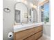 Elegant bathroom with dual sinks, a large mirror, and light wood vanity at 203 Grandin Rd # 3, Charlotte, NC 28208