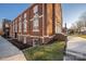 Brick building with stained glass windows and landscaping at 203 Grandin Rd # 3, Charlotte, NC 28208