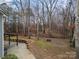 Backyard with patio and wooded area at 2101 Darian Way, Waxhaw, NC 28173