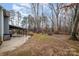 Spacious backyard with a large patio and wooded area at 2101 Darian Way, Waxhaw, NC 28173