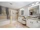 Bathroom with double vanity, soaking tub, and walk-in shower at 2101 Darian Way, Waxhaw, NC 28173