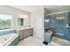 Elegant bathroom with double vanity and a large walk in shower at 2178 Grist Mill Dr, Concord, NC 28025